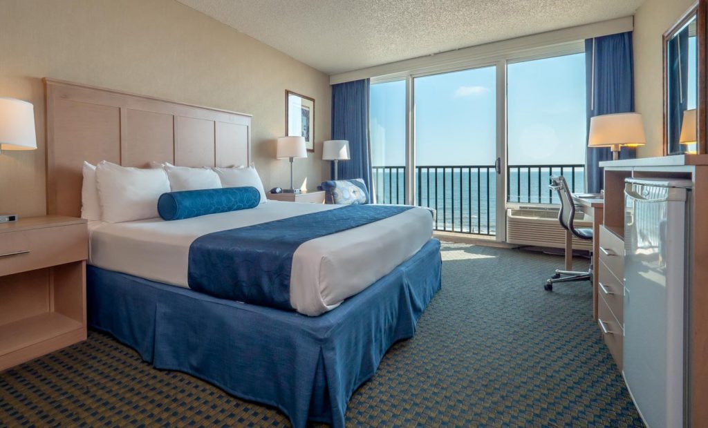 Guest room with balcony overlooking the ocean